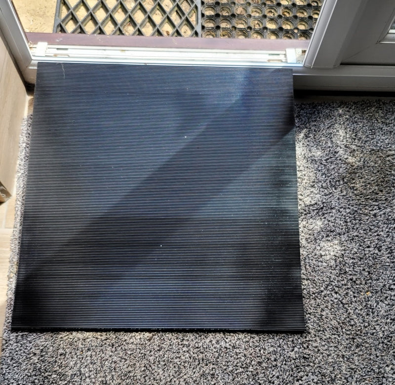 Lightweight threshold ramp for dogs in a doorway